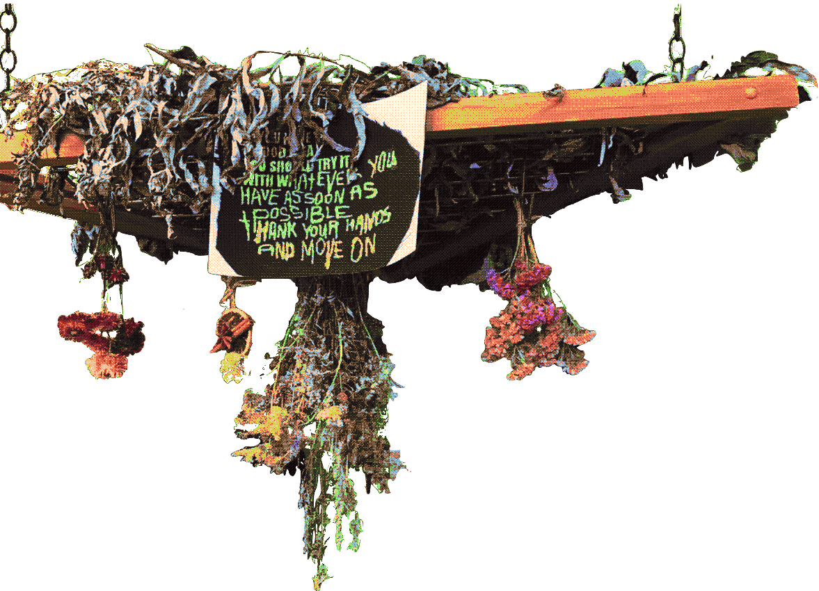 dried herbs and bouquets hang from a suspended platform